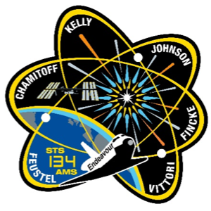 The endeavor space ship flies by a bright star for the Space mission patch